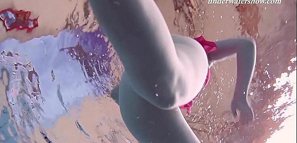 Underwater swimming teenie Lenka gets naked